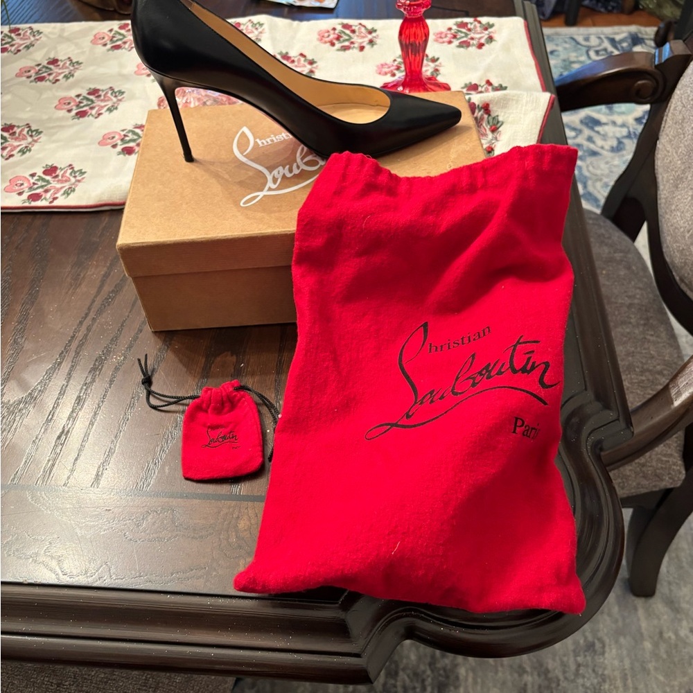 Christian Louboutin Black Pumps with Signature Red Sole